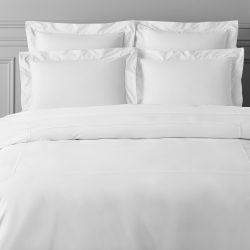 White,Bed,Sheets,And,Pillows